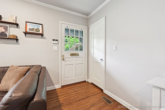 3510 E 21st Pl, Tulsa, OK 74114 - doorway to outside featuring crown molding, wood finished floors, and baseboards