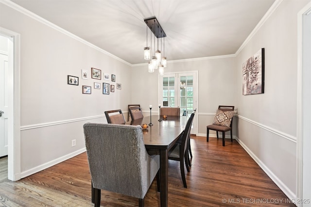 3510 E 21st Pl, Tulsa, OK 74114 - dining area with dark wood-style flooring, crown molding, and baseboards