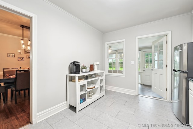 3510 E 21st Pl, Tulsa, OK 74114 - dining space with crown molding and baseboards