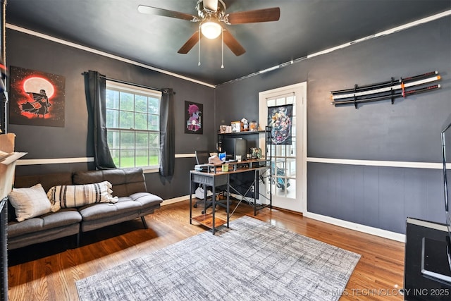 3510 E 21st Pl, Tulsa, OK 74114 - office area featuring wood finished floors, ceiling fan, a wainscoted wall, and baseboards