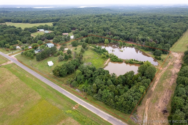 2984 Church Rd, Mead, OK 73449 - aerial view of sparsely populated area featuring a large body of water, a heavily wooded area, and property boundaries highlighted