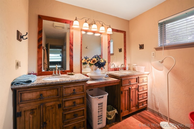 2984 Church Rd, Mead, OK 73449 - bathroom with double vanity, wood finished floors, and healthy amount of natural light