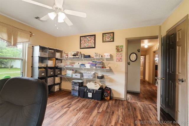 2984 Church Rd, Mead, OK 73449 - home office featuring wood finished floors, a ceiling fan, and baseboards