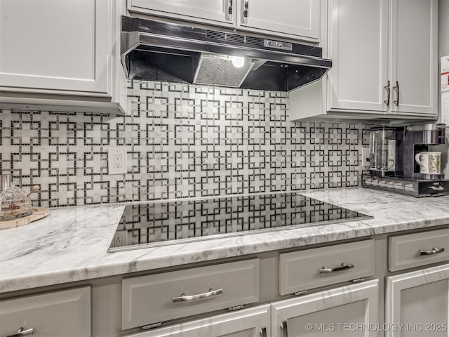 25206 E 64th St, Broken Arrow, OK 74012 - kitchen featuring ventilation hood, tasteful backsplash, black electric cooktop, and white cabinetry
