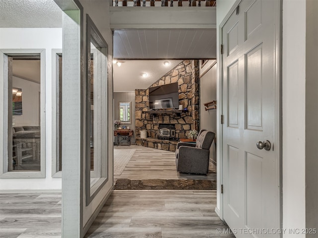 25206 E 64th St, Broken Arrow, OK 74012 - hall with vaulted ceiling and wood finished floors
