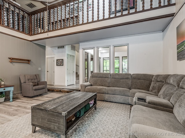 25206 E 64th St, Broken Arrow, OK 74012 - living area with a high ceiling and wood finished floors