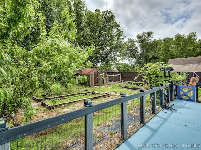 25206 E 64th St, Broken Arrow, OK 74012 - fenced backyard featuring a garden