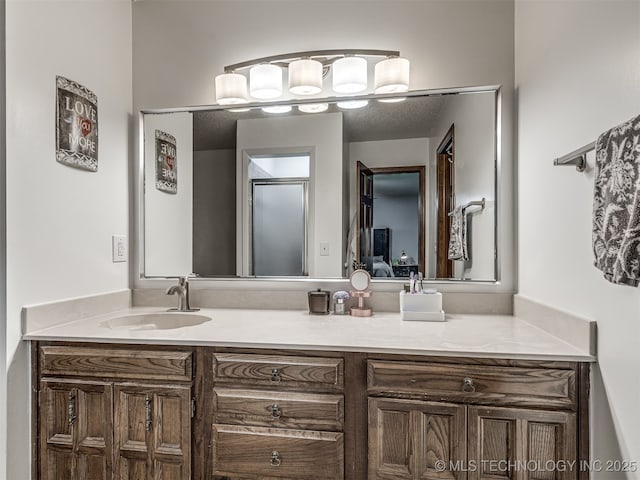 25206 E 64th St, Broken Arrow, OK 74012 - bathroom featuring vanity and a shower with shower door