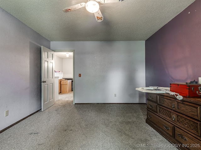 25206 E 64th St, Broken Arrow, OK 74012 - bedroom featuring carpet floors, a textured ceiling, a ceiling fan, and baseboards