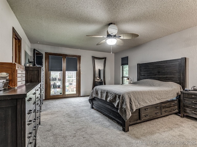 25206 E 64th St, Broken Arrow, OK 74012 - bedroom with carpet flooring, a textured ceiling, a ceiling fan, and access to outside
