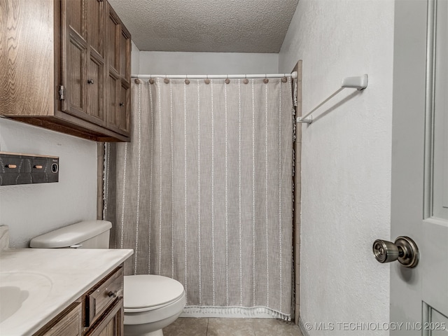 25206 E 64th St, Broken Arrow, OK 74012 - bathroom with toilet, vanity, a textured ceiling, tile patterned flooring, and curtained shower