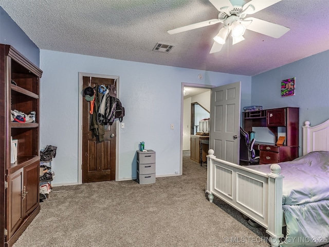 25206 E 64th St, Broken Arrow, OK 74012 - bedroom with a textured ceiling, carpet floors, and a ceiling fan