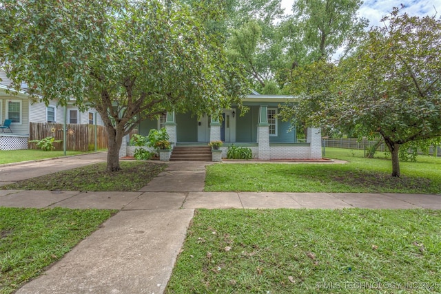 637 S Mounds St, Sapulpa, OK 74066 - obstructed view of property with covered porch and brick siding
