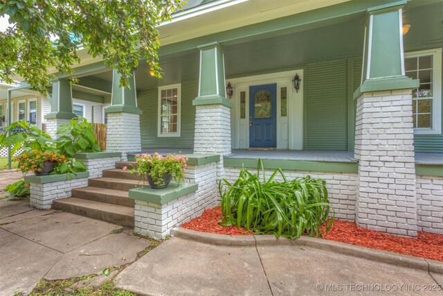637 S Mounds St, Sapulpa, OK 74066 - entrance to property with covered porch and brick siding
