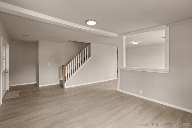 637 S Mounds St, Sapulpa, OK 74066 - spare room featuring stairs, wood finished floors, baseboards, and crown molding