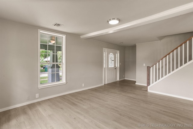 637 S Mounds St, Sapulpa, OK 74066 - entrance foyer with stairs, wood finished floors, and baseboards