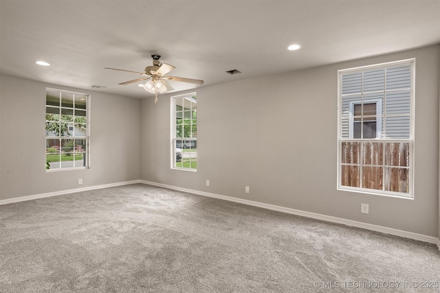 637 S Mounds St, Sapulpa, OK 74066 - empty room featuring plenty of natural light, carpet floors, ceiling fan, baseboards, and recessed lighting