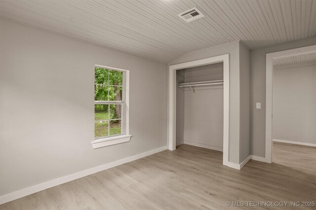637 S Mounds St, Sapulpa, OK 74066 - unfurnished bedroom with wood finished floors, a closet, and baseboards