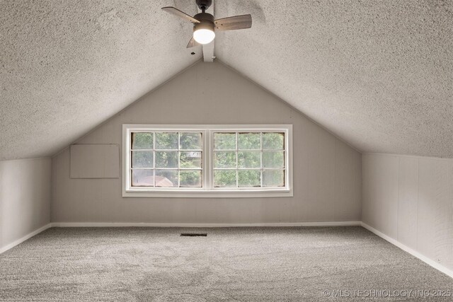 637 S Mounds St, Sapulpa, OK 74066 - additional living space featuring a textured ceiling, a ceiling fan, carpet, lofted ceiling, and baseboards
