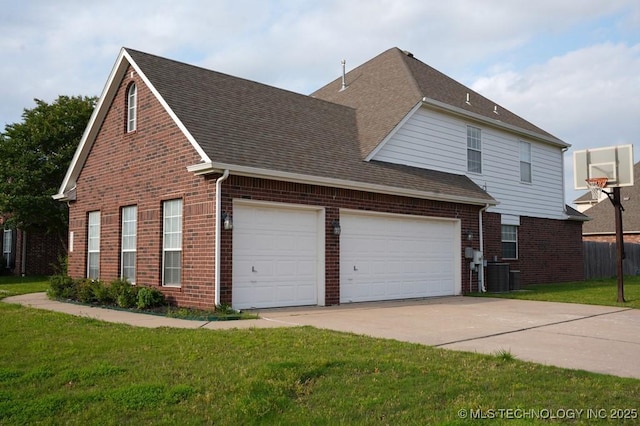 703 N Butternut Ct, Broken Arrow, OK 74012 - view of property exterior featuring brick siding, central AC, concrete driveway, a lawn, and a shingled roof