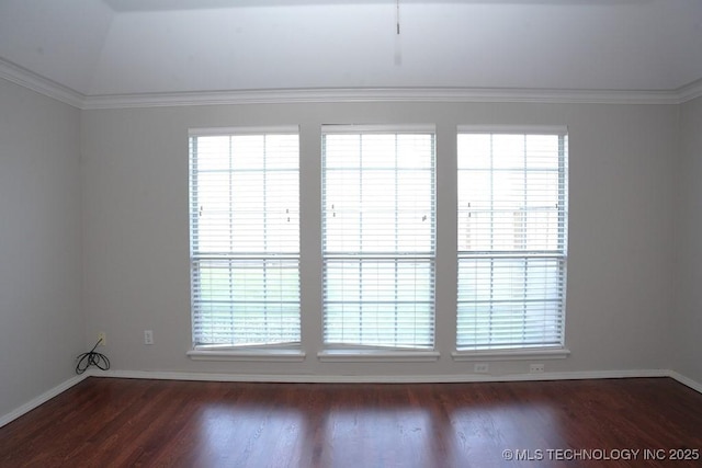 703 N Butternut Ct, Broken Arrow, OK 74012 - spare room with dark wood finished floors, baseboards, healthy amount of natural light, and crown molding