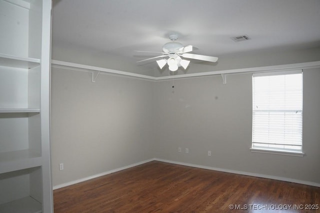 703 N Butternut Ct, Broken Arrow, OK 74012 - spare room featuring ceiling fan, wood finished floors, and baseboards