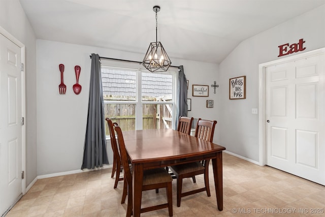 14867 S 281st E Ave, Coweta, OK 74429 - dining space featuring a chandelier, lofted ceiling, baseboards, and light floors