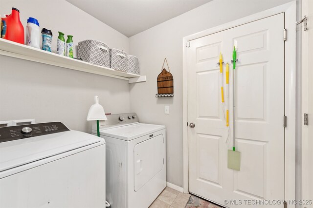 14867 S 281st E Ave, Coweta, OK 74429 - laundry area featuring washing machine and dryer, light tile patterned floors, and baseboards