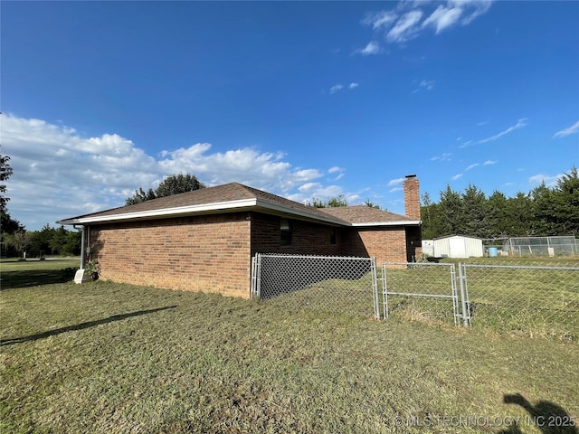 116 Cumberland, Ardmore, OK 73401 - view of property exterior with brick siding and a chimney