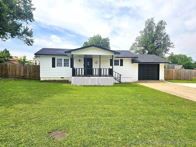 1306 E Shawnee St, Tahlequah, OK 74464 - ranch-style house with covered porch, concrete driveway, an attached garage, and a shingled roof
