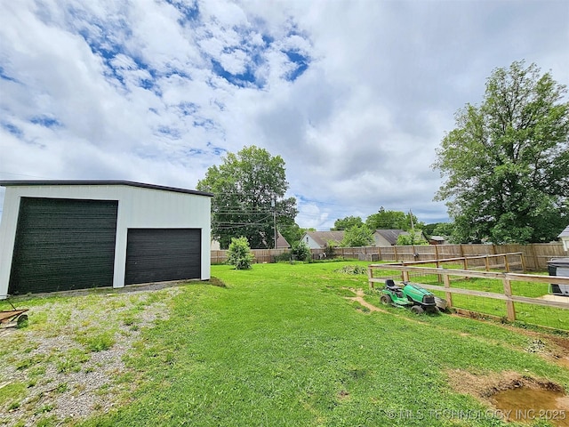 1306 E Shawnee St, Tahlequah, OK 74464 - view of yard with a garage and an outdoor structure
