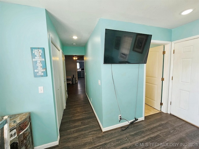 1306 E Shawnee St, Tahlequah, OK 74464 - hallway featuring dark wood finished floors and recessed lighting
