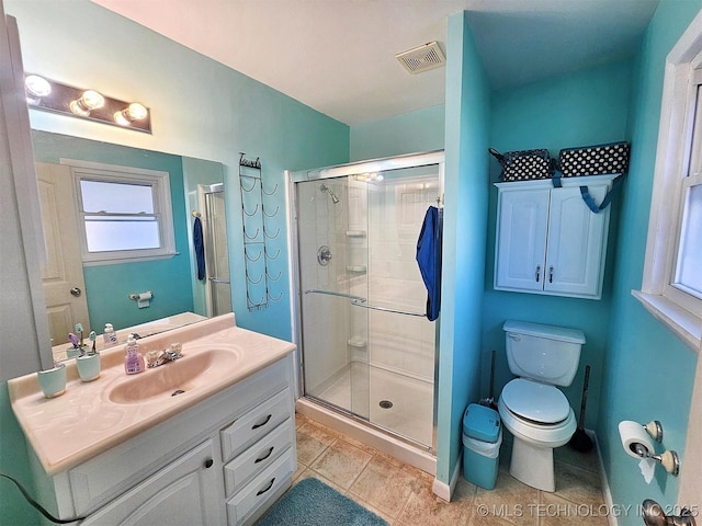 1306 E Shawnee St, Tahlequah, OK 74464 - full bathroom with a shower stall, vanity, and tile patterned flooring