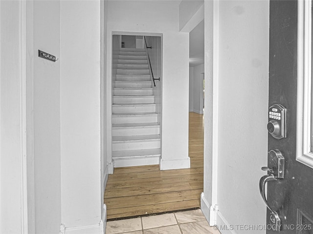 148 W 4th, Atoka, OK 74525 - staircase with baseboards