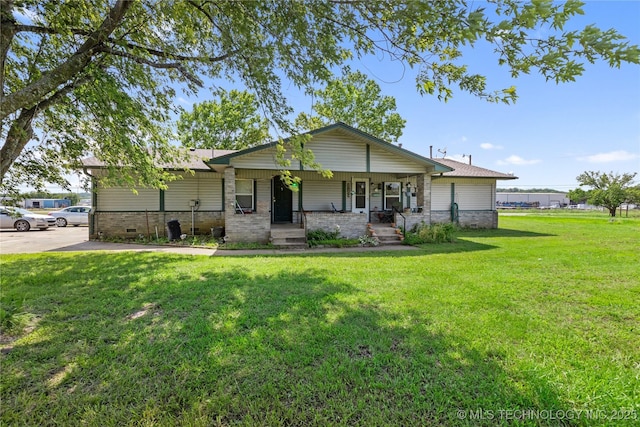 15291 S 4187th Rd, Claremore, OK 74017 - view of front of home with a porch, a front yard, and brick siding