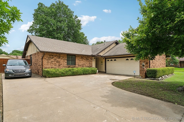 single story home with driveway, brick siding, an attached garage, a shingled roof, and board and batten siding