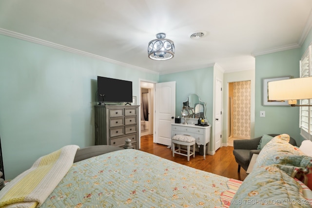 bedroom with dark wood-type flooring, ornamental molding, and baseboards