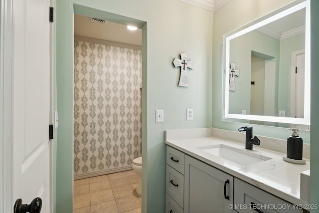 bathroom with crown molding, vanity, toilet, tile patterned flooring, and a shower with shower curtain