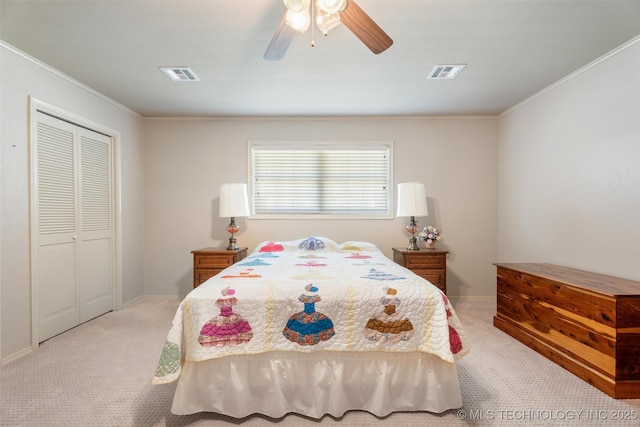 107 W 12th St Unit 107, Bartlesville, OK 74003 - carpeted bedroom with ornamental molding, ceiling fan, and a closet