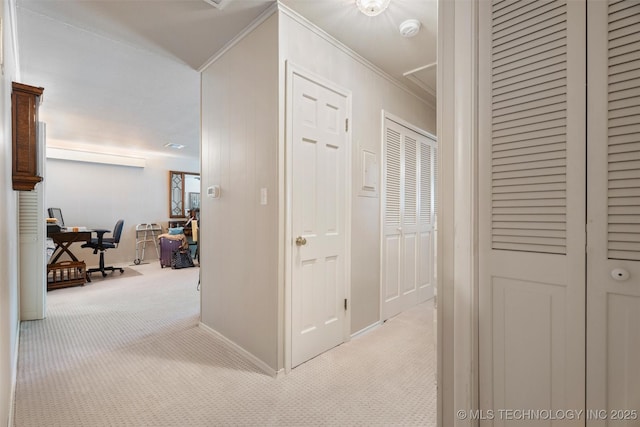 107 W 12th St Unit 107, Bartlesville, OK 74003 - corridor with light carpet, crown molding, and baseboards
