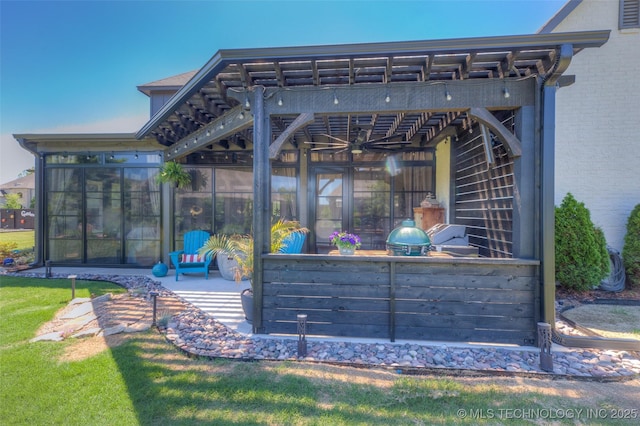 6623 E 134th Pl S, Bixby, OK 74008 - back of property with a sunroom and brick siding