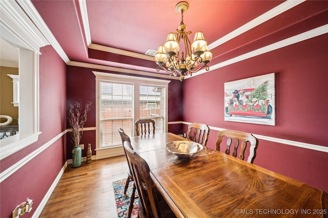 14538 S Urbana Ct, Bixby, OK 74008 - dining room with a chandelier, wood finished floors, ornamental molding, baseboards, and a raised ceiling