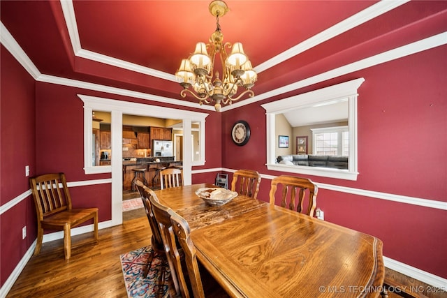 14538 S Urbana Ct, Bixby, OK 74008 - dining space featuring a chandelier, wood finished floors, baseboards, and crown molding