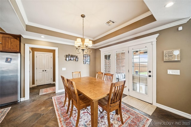 14538 S Urbana Ct, Bixby, OK 74008 - dining room with a raised ceiling, crown molding, a chandelier, baseboards, and recessed lighting