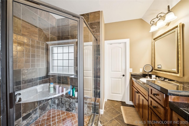 14538 S Urbana Ct, Bixby, OK 74008 - bathroom with a bath, double vanity, a shower stall, and lofted ceiling