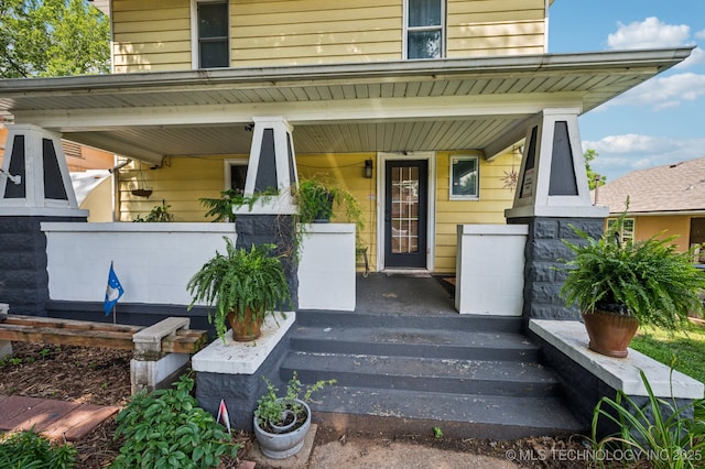 408 S Phoenix Ave, Tulsa, OK 74127 - property entrance featuring a porch