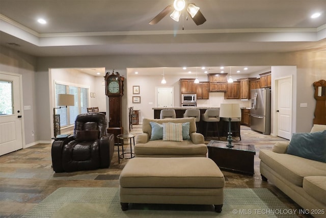 17061 S Creekwood Trl, Claremore, OK 74017 - living room with wood finished floors, ornamental molding, a ceiling fan, recessed lighting, and baseboards