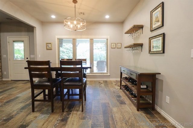 17061 S Creekwood Trl, Claremore, OK 74017 - dining area featuring a chandelier, dark wood-style flooring, baseboards, and recessed lighting