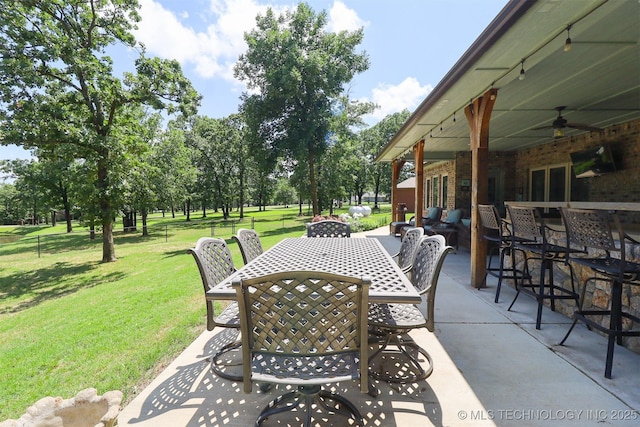 17061 S Creekwood Trl, Claremore, OK 74017 - view of patio / terrace with outdoor dining area and a ceiling fan