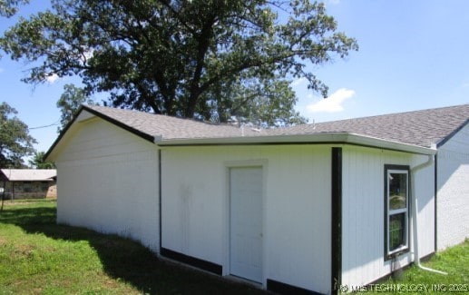 13290 S 4230th Rd, Claremore, OK 74017 - view of property exterior featuring a yard and a shingled roof